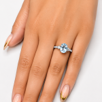 Blue Topaz & Moissanite Ring